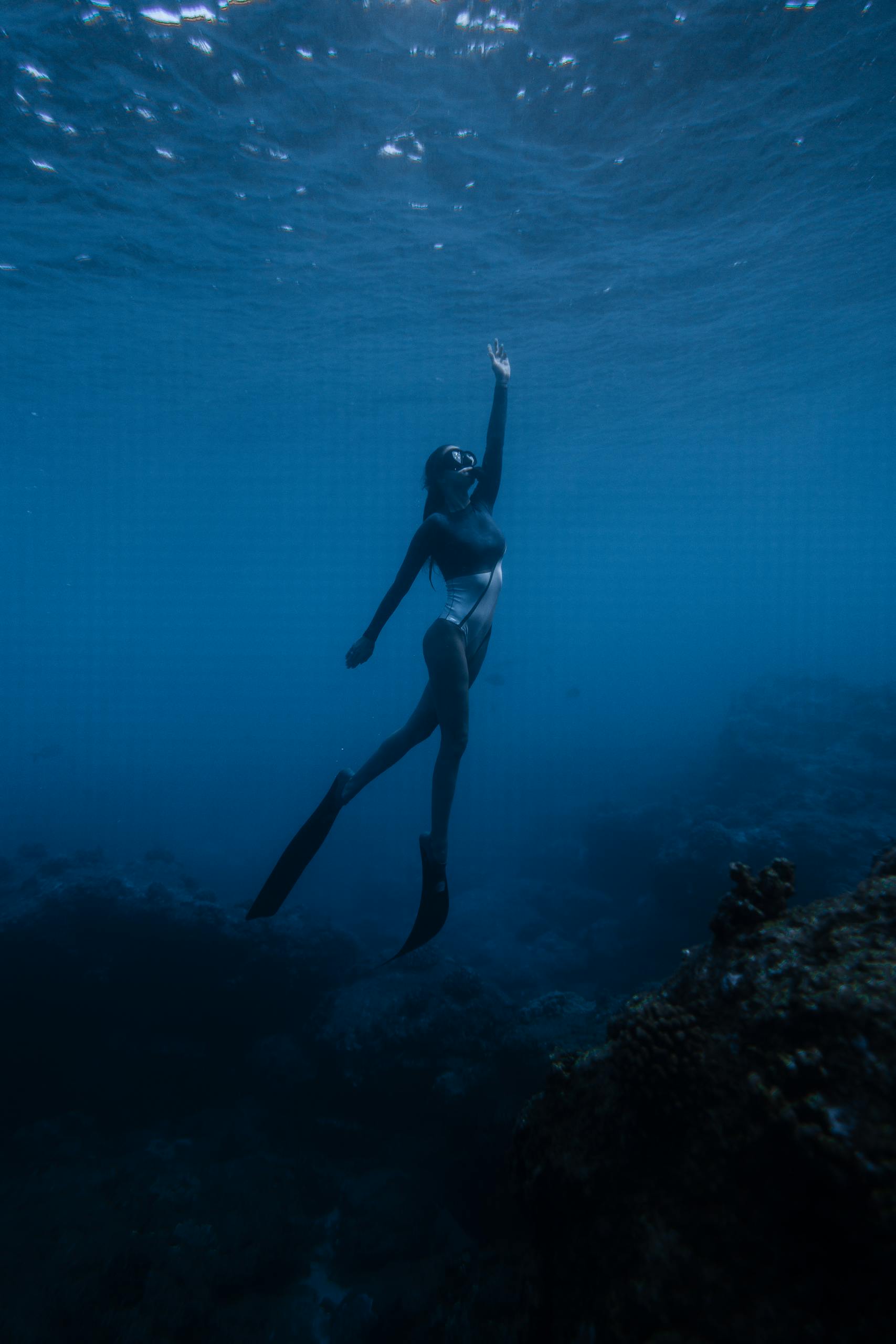 Person Swimming In The Ocean